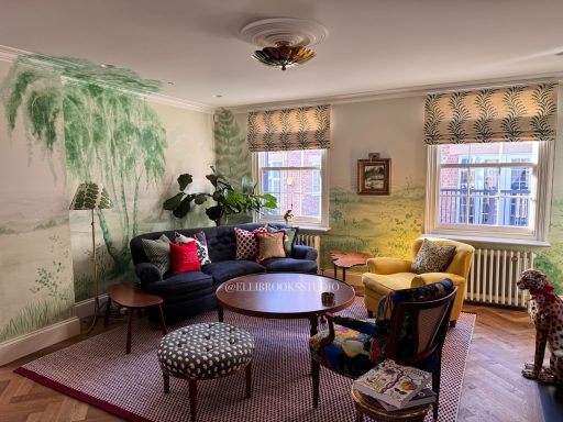 Wide view of custom hand-painted green landscape mural with fading hills, birch, pine and English oak trees.